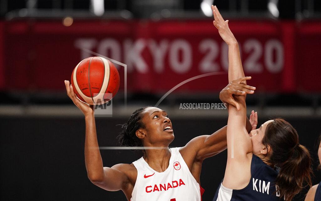 Charlie Neibergall Canada's Kayla Alexander (14), left, shoots over South Korea's Danbi Kim (23) during women's basketball preliminary round game at the 2020 Summer Olympics, Thursday, July 29, 2021, in Saitama, Japan. (AP Photo/Charlie Neibergall)