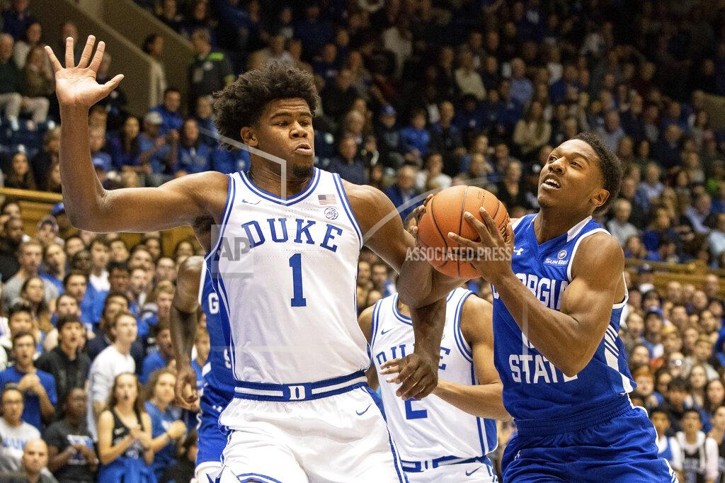 Ben Mckeown Georgia State's Kane Williams, right, drives against Duke's Vernon Carey Jr. (1) during the first half of an NCAA college basketball game in Durham, N.C., Friday, Nov. 15, 2019. (AP Photo/Ben McKeown)