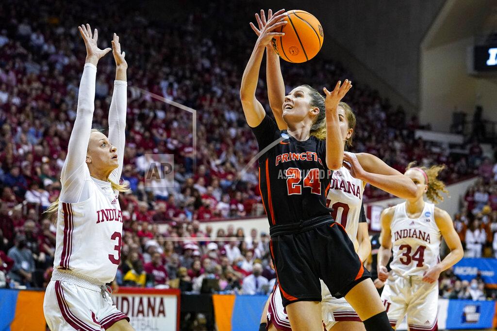 Michael Conroy Princeton guard Julia Cunningham (24) shoots over Indiana guard Grace Waggoner (3) in the first half of a college basketball game in the second round of the NCAA tournament in Bloomington, Ind., Monday, March 21, 2022. (AP Photo/Michael Conroy)