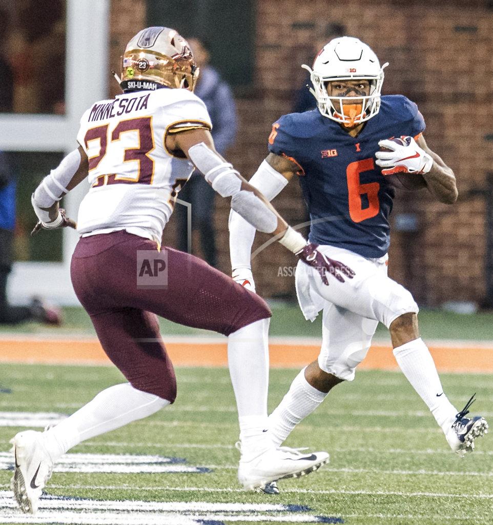 Holly Hart Illinois wide receiver Dominic Stampley (6) runs the ball after making a catch as Minnesota's Jordan Howden (23) defends in the second half of a NCAA college football game Saturday, Nov. 3, 2018, in Champaign, Ill. (AP Photo/Holly Hart)