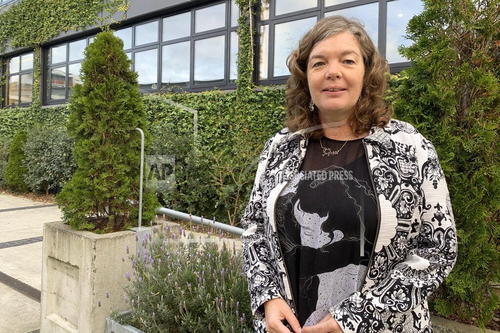 Juliet Gerrard, the chief science advisor to New Zealand Prime Minister Jacinda Ardern, poses for a photo in Wellington, New Zealand on June 11, 2021. Gerrard who has played a key role in New Zealand's lauded coronavirus response says the nation used its luck well to stamp out the disease and is now eyeing the experiences of other countries to determine when it can reopen its borders. (AP Photo/Nick Perry)