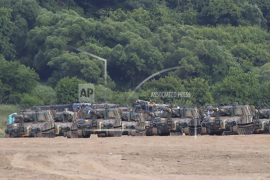 Ahn Young-Joon South Korean army's K-55 self-propelled howitzers are seen at the border with North Korea, South Korea, Tuesday, June 16, 2020. North Korea blew up an inter-Korean liaison office building just inside its border in an act Tuesday that sharply raises tensions on the Korean Peninsula amid deadlocked nuclear diplomacy with the United States. (AP Photo/Ahn Young-joon)