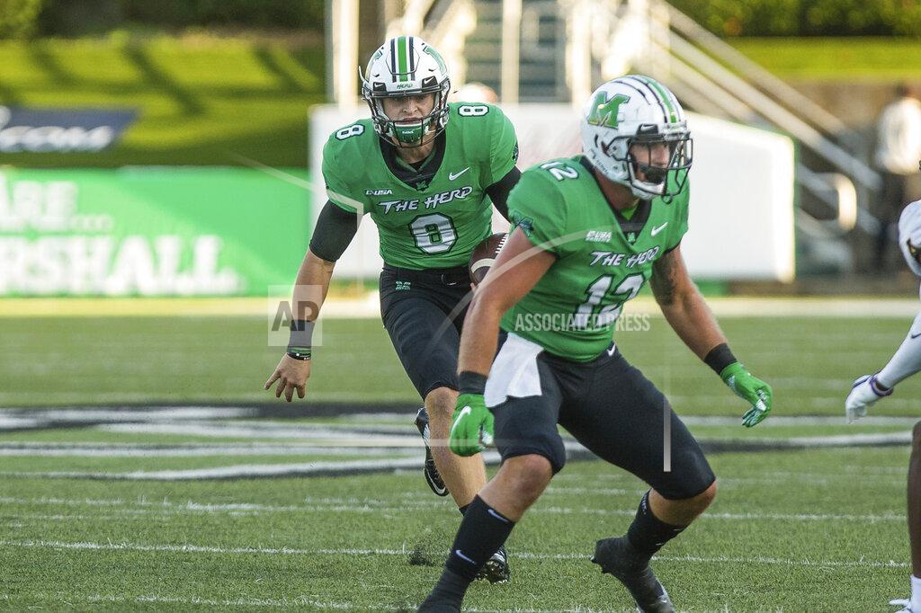 Sholten Singer Marshall quarterback Grant Wells (8) rushes upfield on a keeper against Appalachian State during an NCAA college football game Saturday, Sept. 19, 2020, in Huntington, W.Va. (Sholten Singer/The Herald-Dispatch via AP)