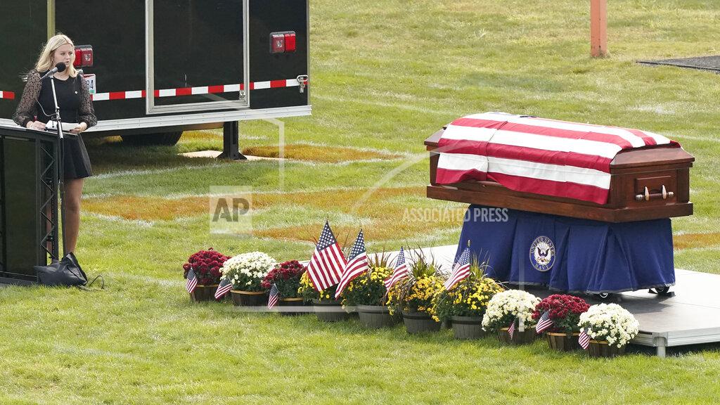 Tony Dejak Josepheen Soviak, sister of Maxton, speaks at the funeral for Navy Corpsman Maxton Soviak at Edison High School Stadium, Monday, Sept. 13, 2021, in Milan, Ohio. Soviak was one of 13 U.S. troops killed in a suicide bombing at Afghanistan's Kabul airport on Aug. 26. (AP Photo/Tony Dejak)