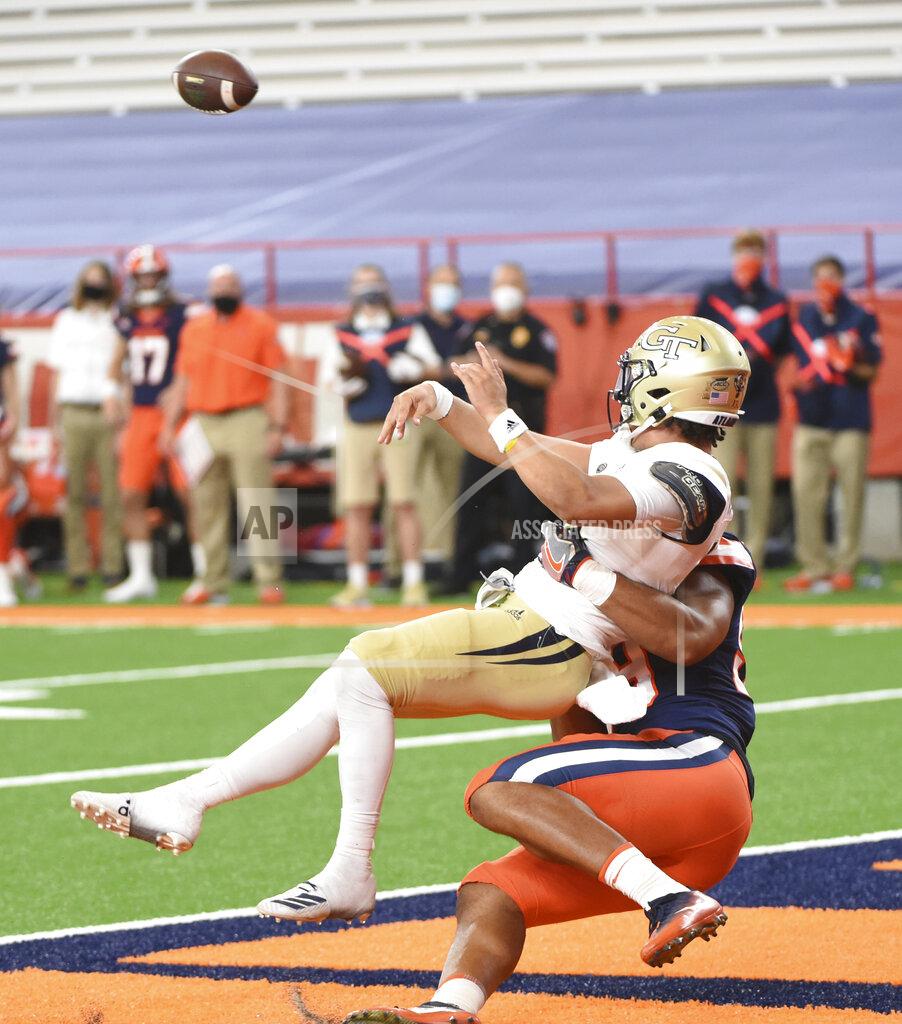 Dennis Nett Georgia Tech quarterback Jordan Yates (13) gets rid of the ball quickly against Syracuse during an NCAA college football game, Saturday, Sept. 26, 2020, at the Carrier Dome in Syracuse, N.Y. (Dennis Nett/The Post-Standard via AP)