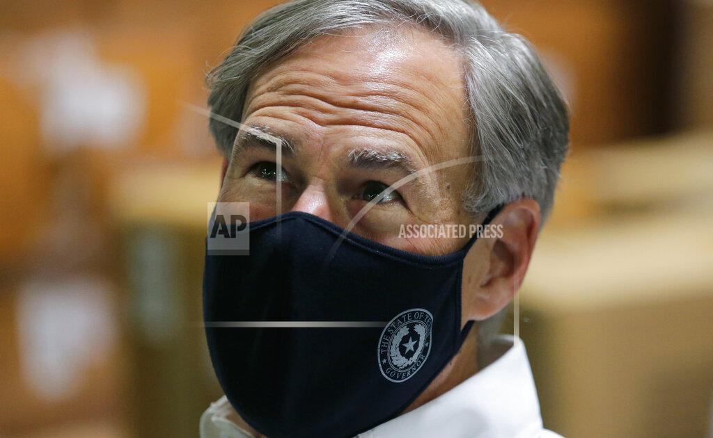 Eric Gay Texas Gov. Greg Abbott visits a Texas Division of Emergency Management Warehouse filled with Personal Protective Equipment, Tuesday, Aug. 4, 2020, in San Antonio. (AP Photo/Eric Gay)