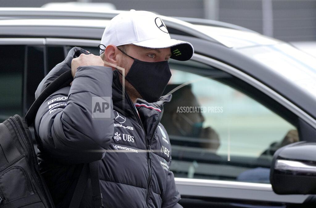Sergei Grits Mercedes driver Valtteri Bottas of Finland arrives for the first practice session at the Sochi Autodrom circuit, in Sochi, Russia, Friday, Sept. 24, 2021. The Russian Formula One Grand Prix will be held on Sunday. (AP Photo/Sergei Grits)