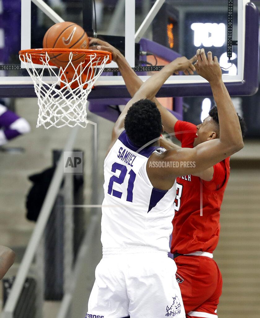 Tony Gutierrez TCU center Kevin Samuel (21) is unable to stop Texas Tech guard Jarrett Culver (23) from dunking the ball in the second half of an NCAA college basketball game in Fort Worth, Texas, Saturday, March 2, 2019. (AP Photo/Tony Gutierrez)