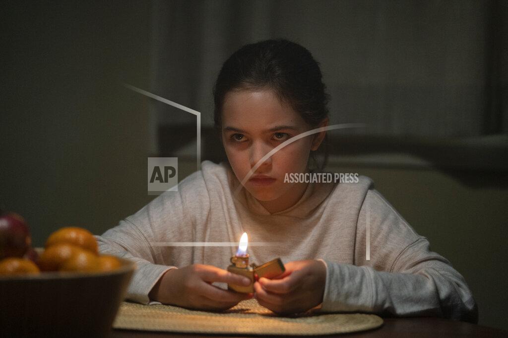 Ken Woroner This image released by Universal Pictures shows Ryan Kiera Armstrong in a scene from "Firestarter." (Ken Woroner/Universal Pictures via AP)