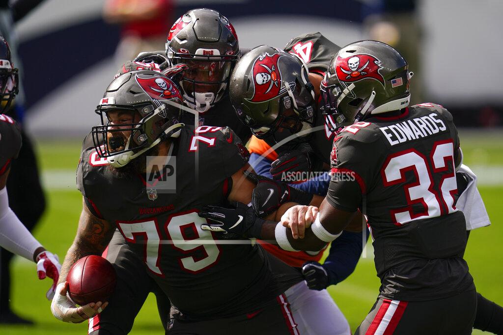 David Zalubowski Tampa Bay Buccaneers defensive end Pat O'Connor (79) reacts with teammates after a blocking a punt second half of an NFL football game against the Denver Broncos, Sunday, Sept. 27, 2020, in Denver. (AP Photo/David Zalubowski)
