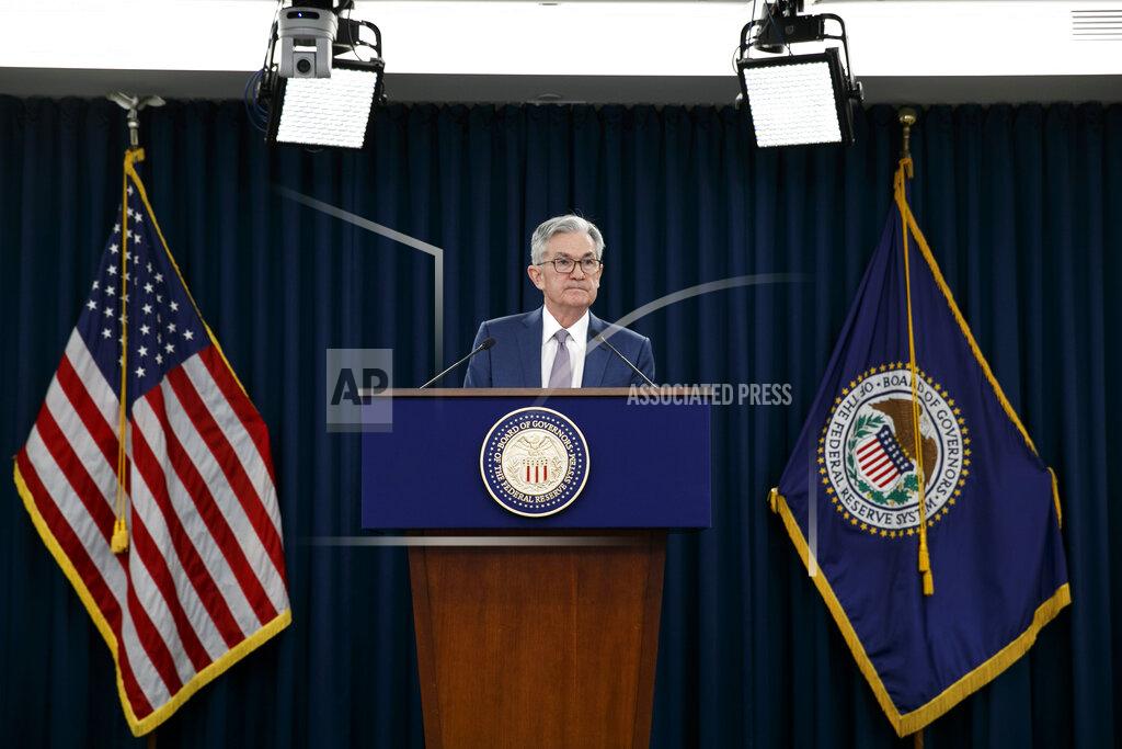 Jacquelyn Martin FILE - In this March 3, 2020 file photo, Federal Reserve Chair Jerome Powell speaks during a news conference to discuss an announcement from the Federal Open Market Committee, in Washington. The Federal Reserve said Friday, April 24, it had $85.8 billion in loans outstanding last week in three of the programs it rolled out last month to protect the economy during the coronavirus pandemic. (AP Photo/Jacquelyn Martin, File)