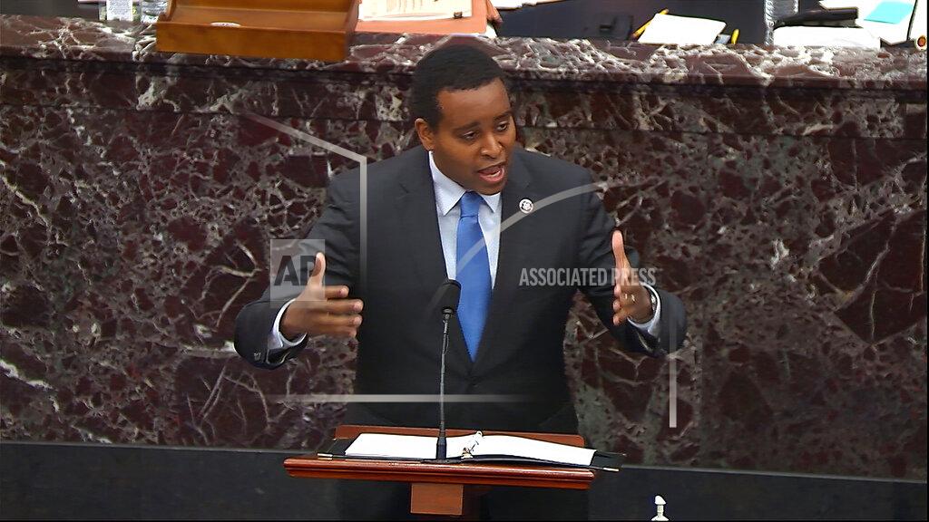 Uncredited In this image from video, House impeachment manager Rep. Joe Neguse, D-Colo., speaks during the second impeachment trial of former President Donald Trump in the Senate at the U.S. Capitol in Washington, Tuesday, Feb. 9, 2021. (Senate Television via AP)