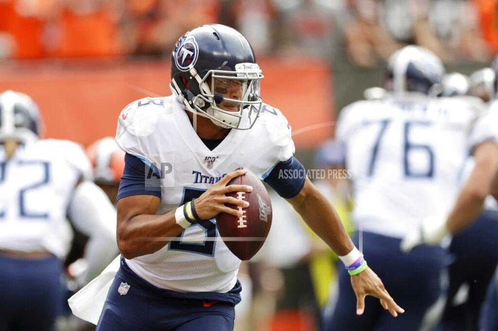 Ron Schwane Tennessee Titans quarterback Marcus Mariota looks to pass during the first half in an NFL football game against the Cleveland Browns, Sunday, Sept. 8, 2019, in Cleveland. (AP Photo/Ron Schwane)