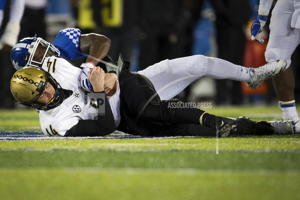 Bryan Woolston Kentucky offensive tackle Naasir Watkins (66) sacks Vanderbilt quarterback Kyle Shurmur during the second half of an NCAA college football game in Lexington, Ky., Saturday, Oct. 20, 2018. Kentucky won, 14-7. (AP Photo/Bryan Woolston)