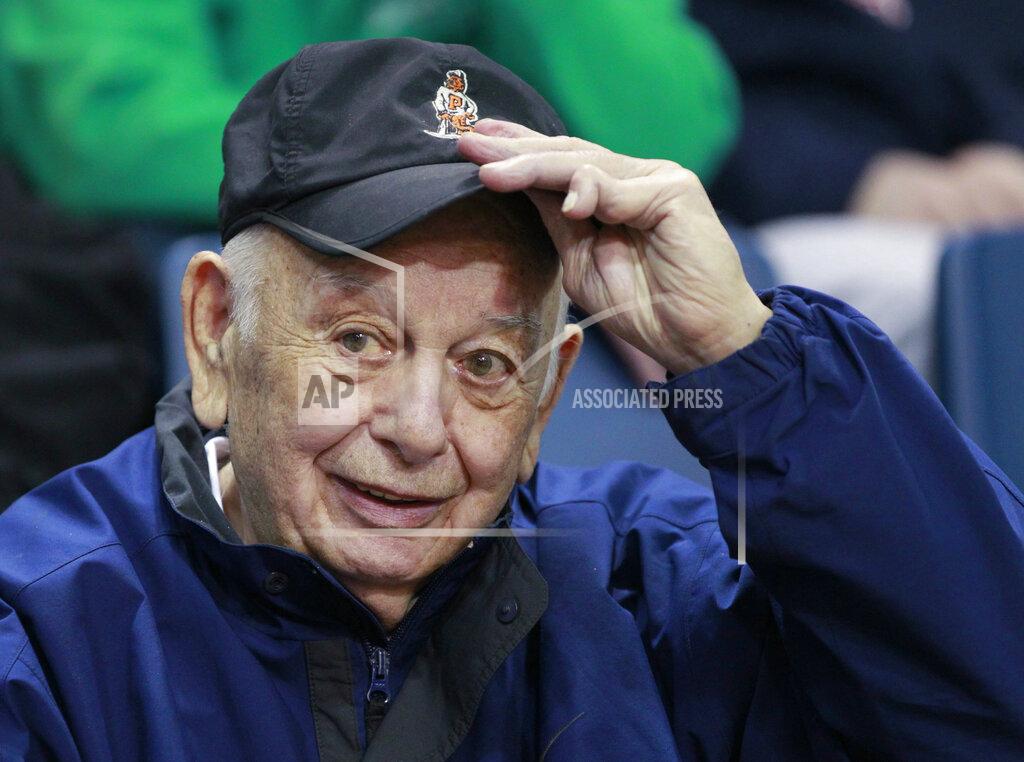 Charles Fox FILE - Former Princeton basketball coach Pete Carril tips his hat during an NCAA college basketball game between Richmond and La Salle on Feb. 5, 2015, in Philadelphia. Carril, the rumpled, cigar-smoking coach who led Princeton to 11 appearances in the NCAA tournament, where his teams unnerved formidable opponents and rattled March Madness with old-school fundamentals, died Monday, Aug. 15, 2022. He was 92. (Charles Fox/The Philadelphia Inquirer via AP, File)
