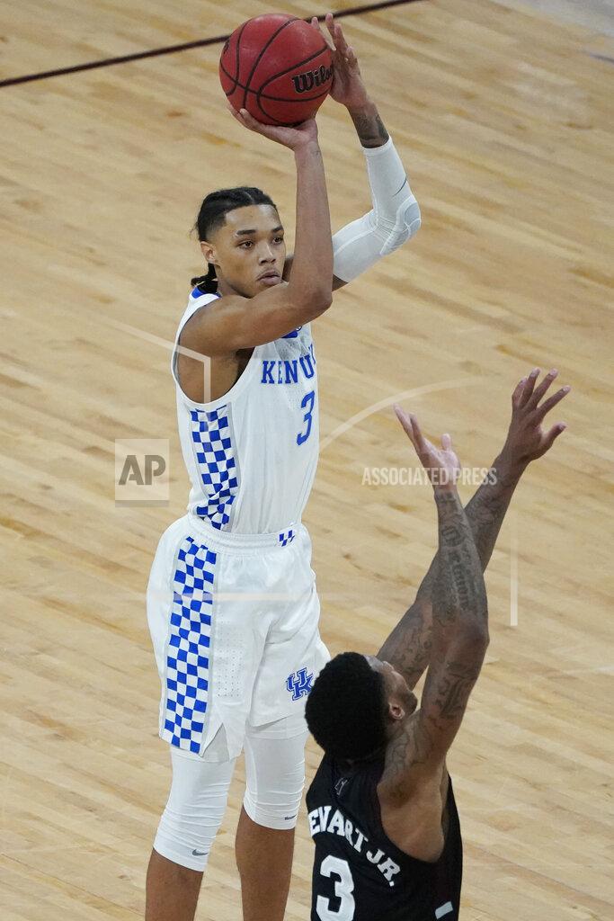 Rogelio V. Solis Kentucky guard Brandon Boston Jr., top, attempts to shoot over the defense of Mississippi State guard D.J. Stewart Jr., bottom, during the second half of an NCAA college basketball game in Starkville, Miss., Saturday, Jan. 2, 2021. (AP Photo/Rogelio V. Solis)