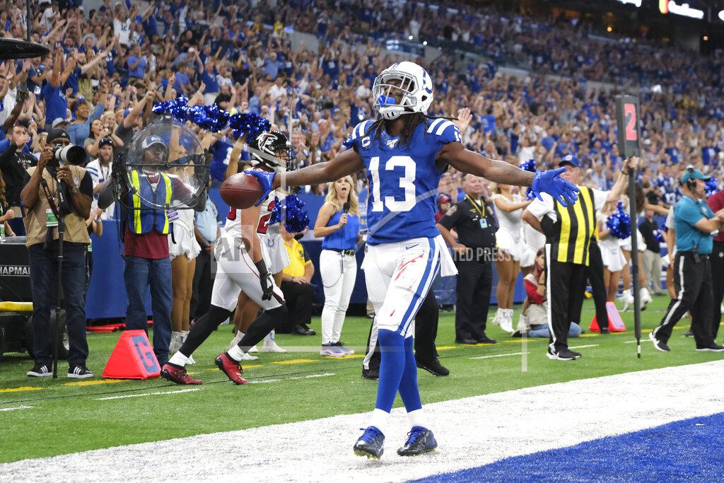 Aj Mast Indianapolis Colts wide receiver T.Y. Hilton (13) reacts after making a touchdown reception during the first half of an NFL football game against the Atlanta Falcons, Sunday, Sept. 22, 2019, in Indianapolis. (AP Photo/AJ Mast)