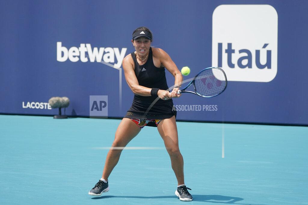 Wilfredo Lee Jessica Pegula returns a shot from Sloane Stephens, during the Miami Open tennis tournament, Friday, March 25, 2022, in Miami Gardens, Fla. (AP Photo/Wilfredo Lee)