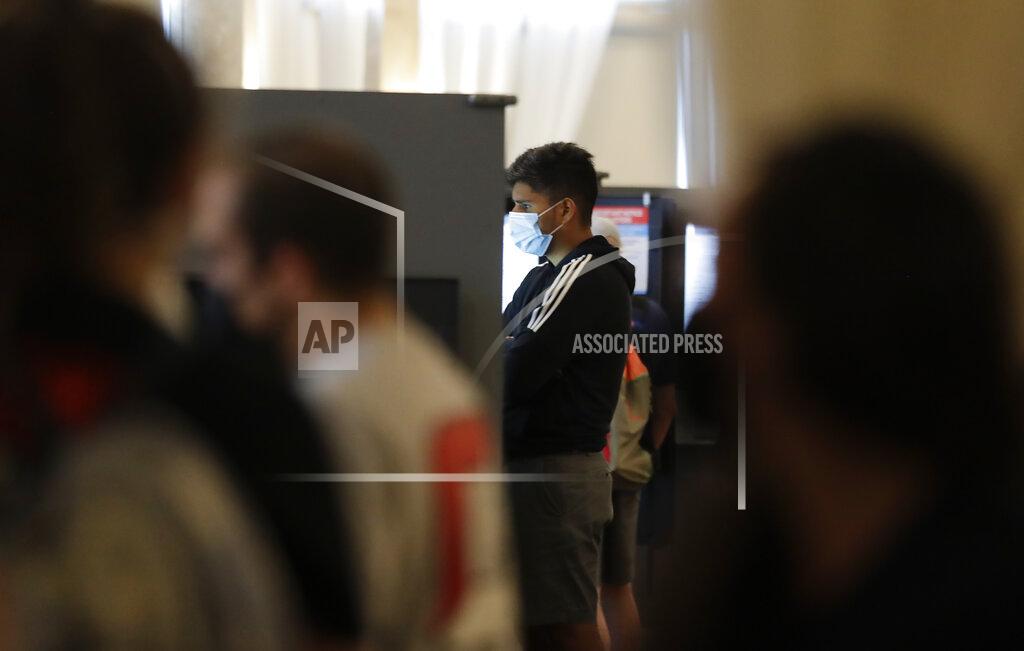 Brynn Anderson A person votes in the Georgia's primary election at Park Tavern on Tuesday, June 9, 2020, in Atlanta. (AP Photo/Brynn Anderson)