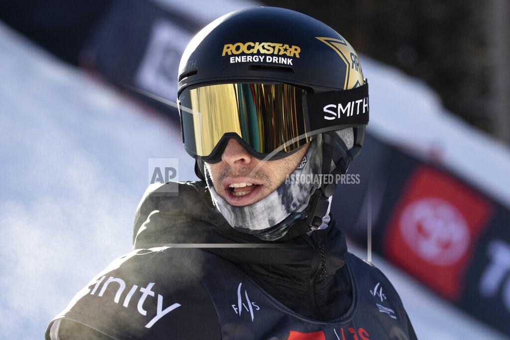 Hugh Carey Chase Josey, of United States, checks the score following his run in the halfpipe finals Saturday, Dec. 11, 2021, at the U.S. Grand Prix snowboarding event at Copper Mountain, Colo. (AP Photo/Hugh Carey)