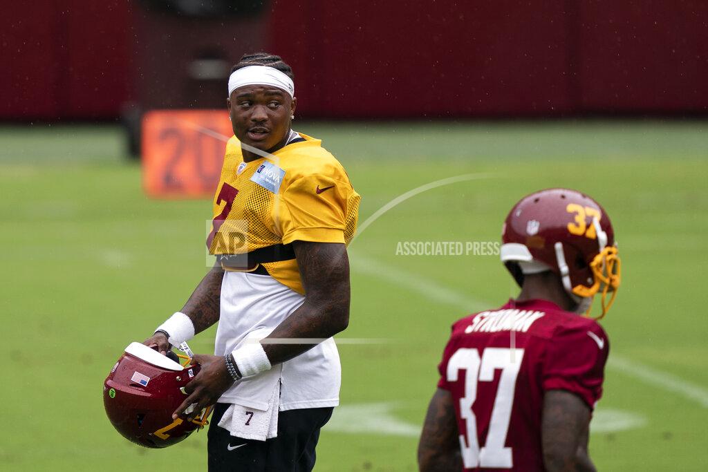 Alex Brandon Washington quarterback Dwayne Haskins Jr. (7) looks over his shoulder during an NFL football practice at FedEx Field, Monday, Aug. 31, 2020, in Washington. (AP Photo/Alex Brandon)