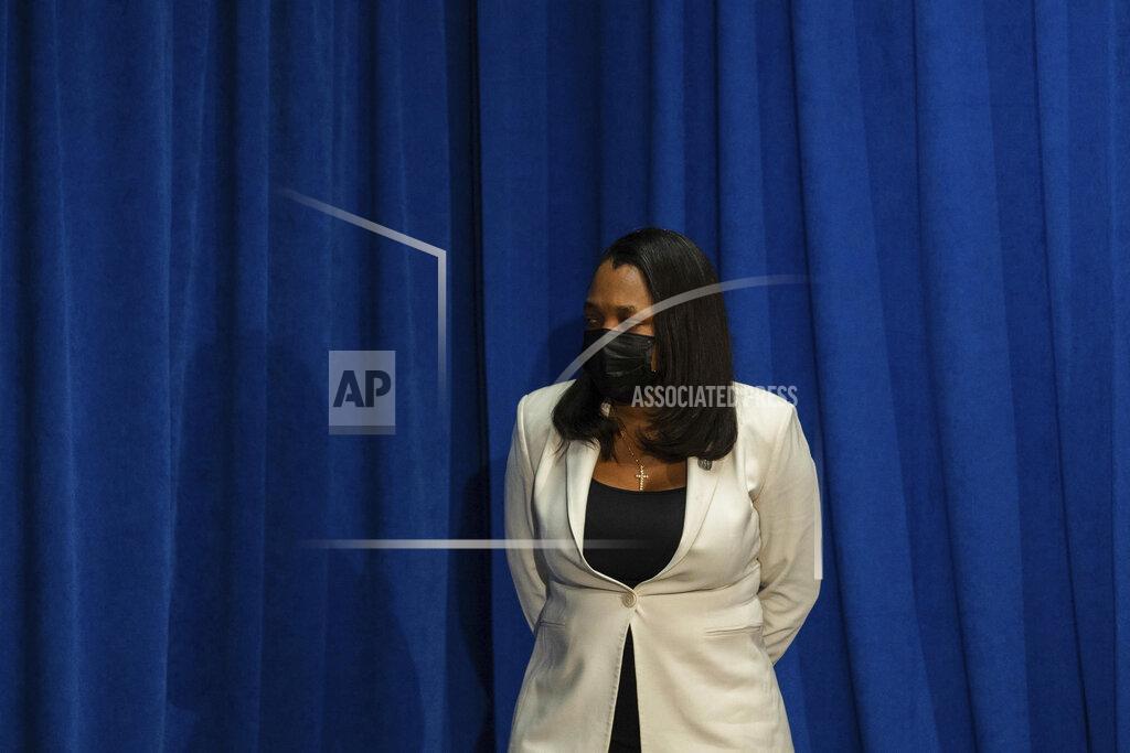Pat Nabong Chicago Public Schools CEO Janice Jackson listens during a press conference where Chicago Mayor Lori Lightfoot demanded the Chicago Teachers Union to reach a deal with Chicago Public Schools on a reopening plan at City Hall, Thursday, Feb. 4, 2021. (Pat Nabong/Chicago Sun-Times via AP)