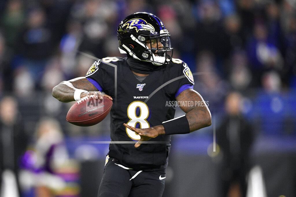Nick Wass Baltimore Ravens quarterback Lamar Jackson throws a pass against the New York Jets during the first half of an NFL football game, Thursday, Dec. 12, 2019, in Baltimore. (AP Photo/Nick Wass)