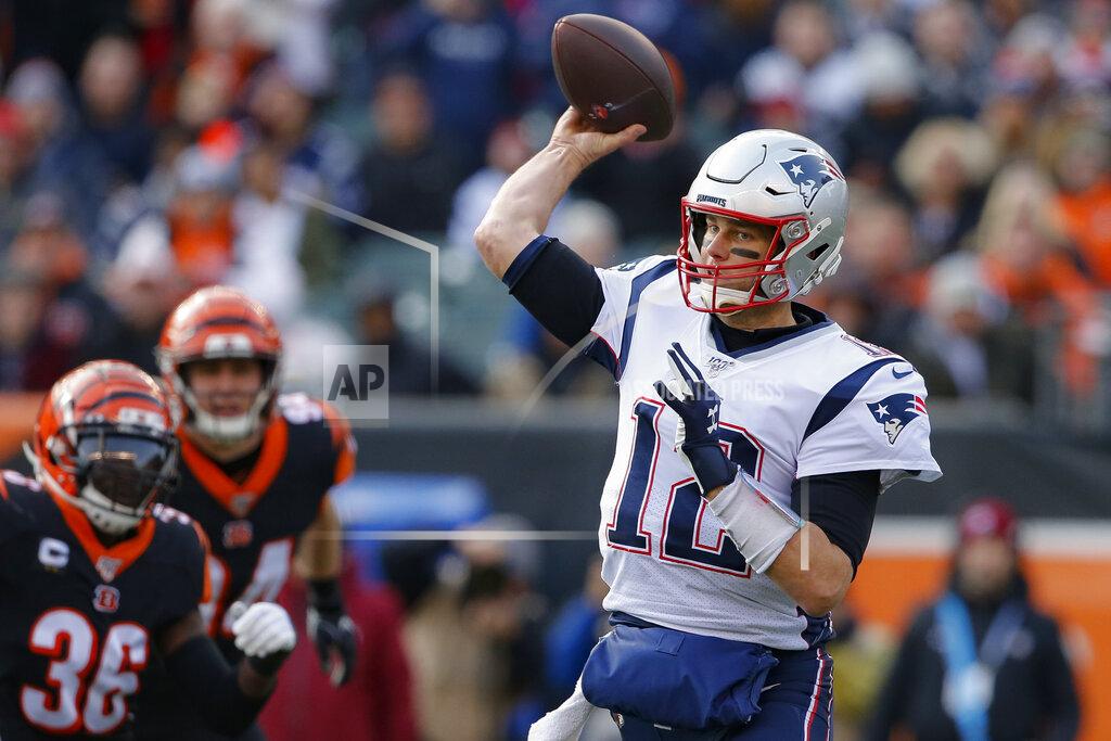 Gary Landers New England Patriots quarterback Tom Brady (12) passes in the first half of an NFL football game against the New England Patriots, Sunday, Dec. 15, 2019, in Cincinnati. (AP Photo/Gary Landers)