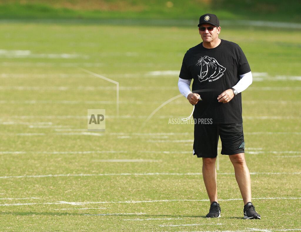 Jason E. Miczek Carolina Panthers NFL football head coach Ron Rivera watches his team warm up before practice Monday, June 3, 2019, in Charlotte, N.C. (AP Photo/Jason E. Miczek)