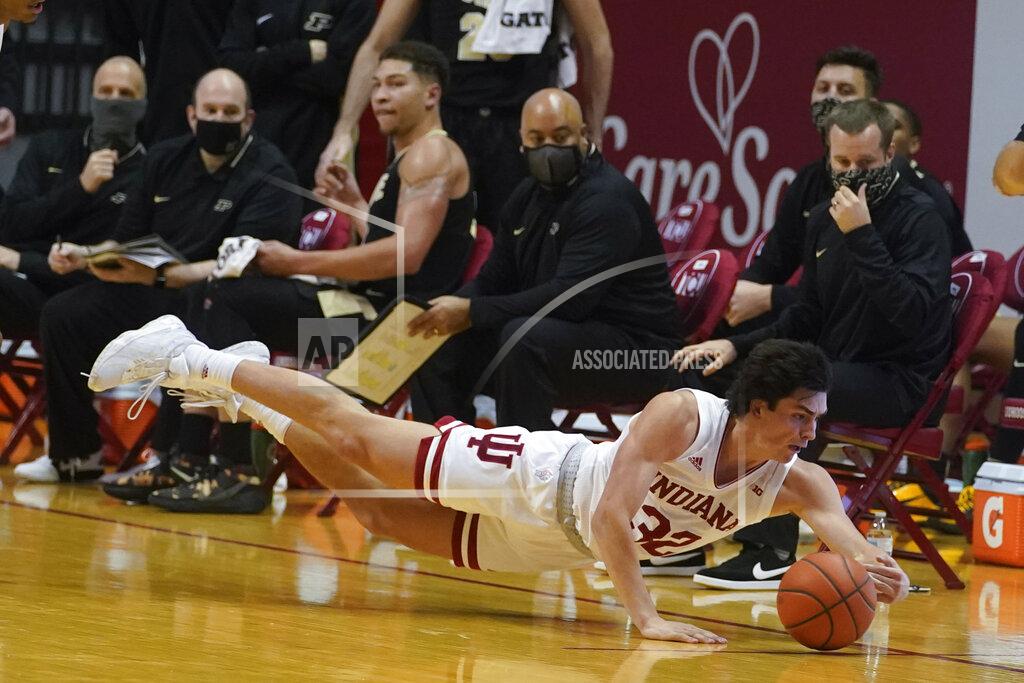 Darron Cummings Indiana's Trey Galloway (32) dives for a loose ball during the second half of an NCAA college basketball game against Purdue, Thursday, Jan. 14, 2021, in Bloomington Ind. Purdue won 81-69. (AP Photo/Darron Cummings)