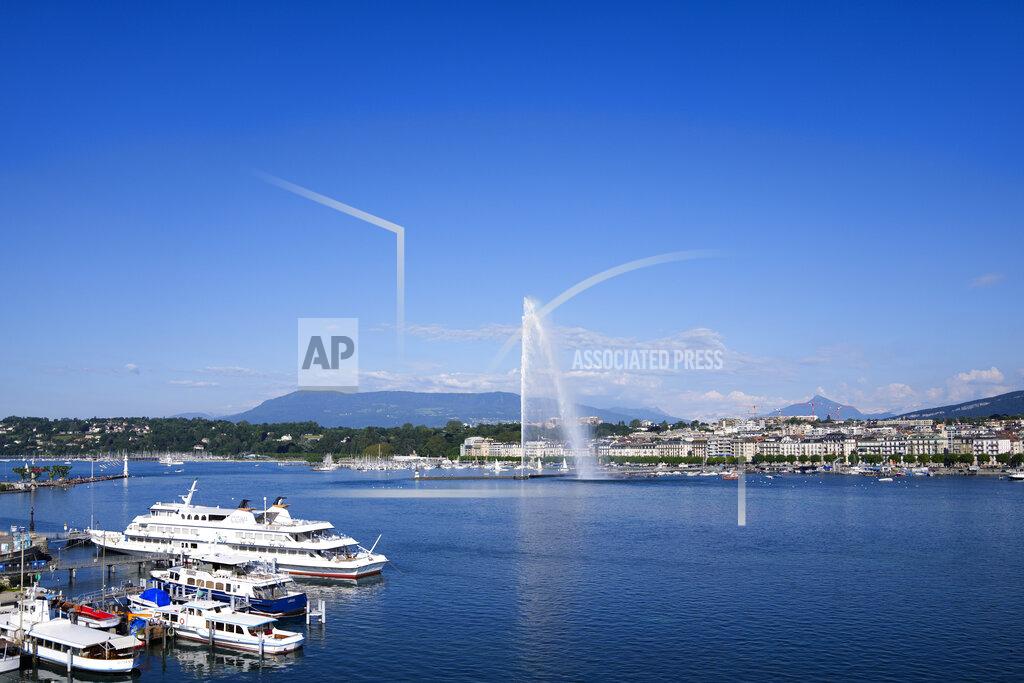 Markus Schreiber The fountain Jet d'eau in the Lake Geneva spray water, in Geneva, Switzerland Monday, June 14, 2021. The lakeside city known as a Cold War crossroads and a hub for Swiss discretion, neutrality and humanitarianism, is set to return to a spotlight on the world stage as U.S. President Joe Biden and Russian President Vladimir Putin come to town for a summit on Wednesday, June 16. (AP Photo/Markus Schreiber)