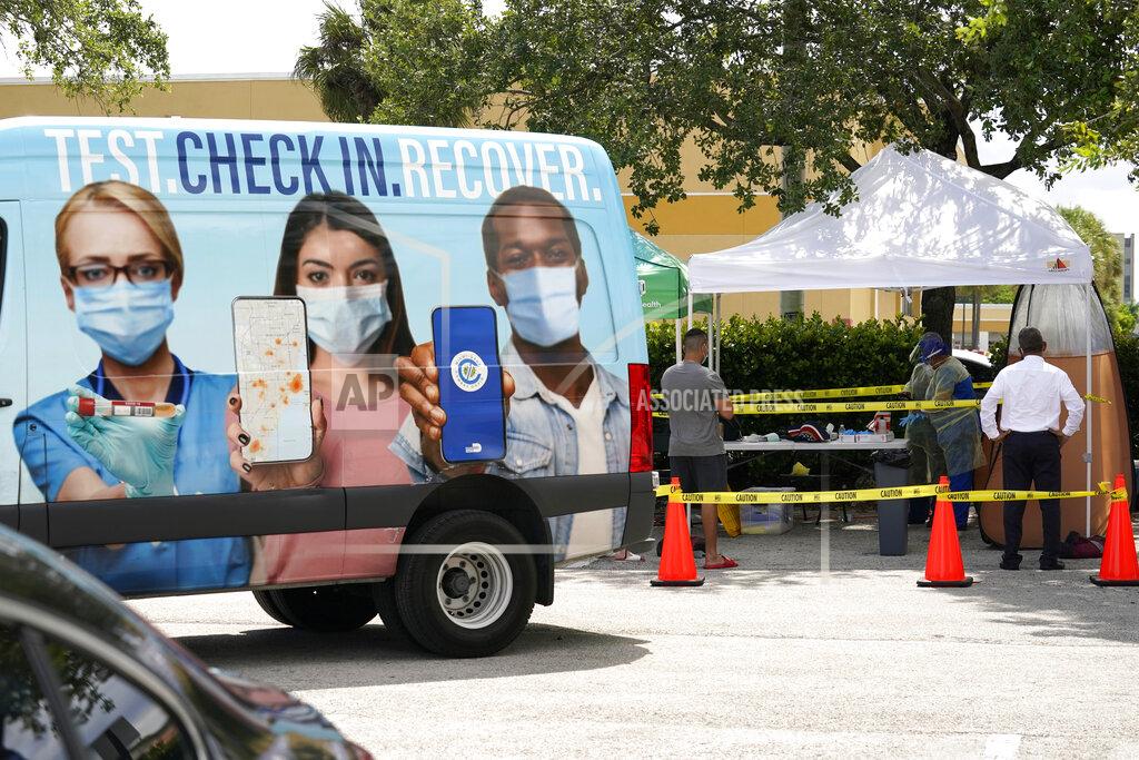 Lynne Sladky People wait in line at a Miami-Dade County COVID-19 testing site, Monday, July 26, 2021, in Hialeah, Fla. Florida accounted for a fifth of the nation's new infections last week, more than any other state, according to the U.S. Centers for Disease Control and Prevention. (AP Photo/Lynne Sladky)