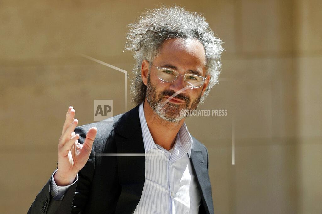 FILE - In this Wednesday, May 15, 2019, file photo, Palantir CEO Alex Karp arrives for the Tech for Good summit in Paris. Palantir Technologies Inc., a data-mining company with deep ties to U.S. intelligence and military agencies, has shed a good deal of its trademark secrecy about its business in filing for a Wall Street stock offering, on Tuesday, Aug. 25, 2020. (AP Photo/Thibault Camus, File)