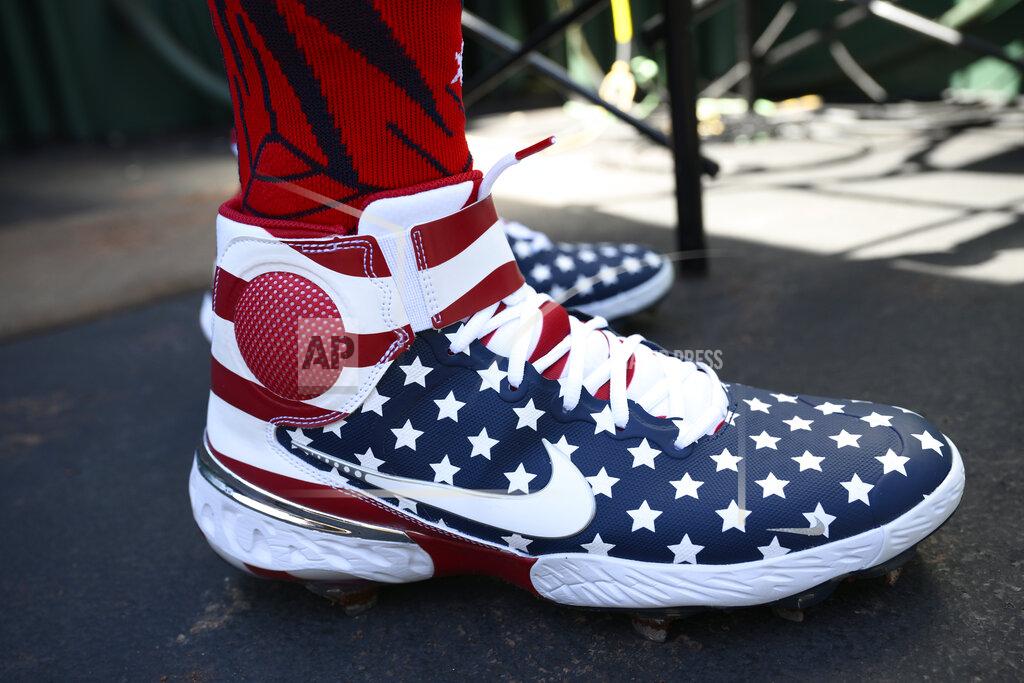 Nick Wass Washington Nationals' Nelson Cruz wears patriotic themed shoes before a baseball game against the Miami Marlins, Monday, July 4, 2022, in Washington. (AP Photo/Nick Wass)