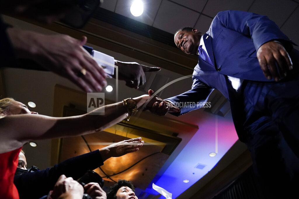 Ashley Landis Republican conservative radio show host Larry Elder greets supporters after losing the California gubernatorial recall election Tuesday, Sept. 14, 2021, in Costa Mesa, Calif. The rare, late-summer election, which challenged California Governor Gavin Newsom, has emerged as a national battlefront on issues from COVID-19 restrictions to climate change. (AP Photo/Ashley Landis)