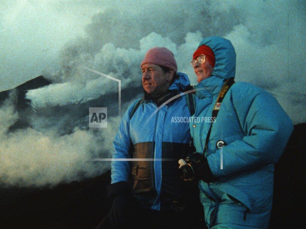 Uncredited This image released by National Geographic shows Maurice Krafft, left, and Katia Krafft in a scene from the documentary "Fire of Love." (National Geographic via AP)