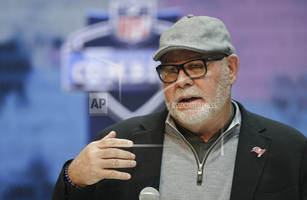 Darron Cummings FILE - In this Feb. 27, 2019, file photo, Tampa Bay Buccaneers head coach Bruce Arians speaks during a press conference at the NFL football scouting combine in Indianapolis. Arians is the latest coach taking a stab at making the Bucs relevant again. The former Arizona Cardinals coach came out of retirement in January to replace Dirk Koetter, who was fired after another losing season extended the club's playoff drought to 11 consecutive seasons. And while Arians insists the Bucs are not in a rebuilding mode, it sure seems that way heading into yet another draft where Tampa Bay will continue an ongoing effort to fill holes in a leaky defense. (AP Photo/Darron Cummings, File)