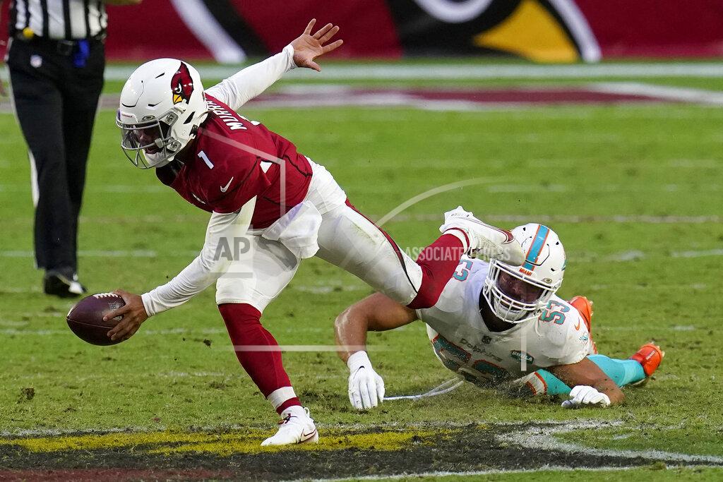 Ross D. Franklin Arizona Cardinals quarterback Kyler Murray (1) eludes the reach of Miami Dolphins middle linebacker Kyle Van Noy (53) during the second half of an NFL football game, Sunday, Nov. 8, 2020, in Glendale, Ariz. (AP Photo/Ross D. Franklin)