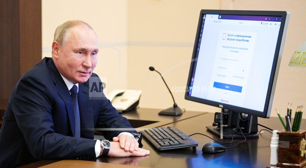 Alexei Druzhinin Russian President Vladimir Putin attends a remote electronic voting during Parliamentary elections at the Novo-Ogaryovo residence outside Moscow, Russia, Friday, Sept. 17, 2021. Russia has begun three days of voting for a new parliament that is unlikely to change the country's political complexion. There's no expectation that United Russia, the party devoted to President Vladimir Putin, will lose its dominance in the State Duma. (Alexei Druzhinin, Sputnik, Kremlin Pool Photo via AP)