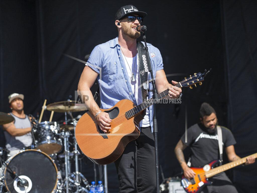 Eric Jamison FILE - Chase Rice performs with his band at the 4th Annual ACM Party for a Cause Festival at the Las Vegas Festival Grounds in L:as Vegas, in this Sunday, April 3, 2016, file photo. Like many young football players growing up in North Carolina, Chase Rice had his sights set on the NFL. (Photo by Eric Jamison/Invision/AP, File)