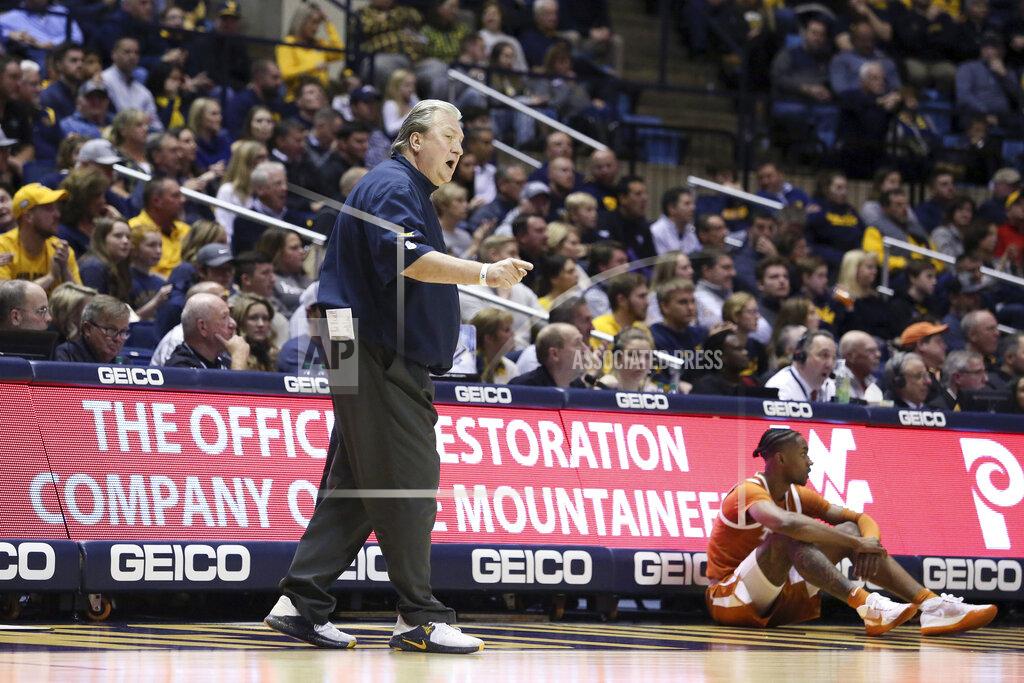 Kathleen Batten West Virginia coach Bob Huggins reacts to a call during the first half of an NCAA college basketball game against Texas Monday, Jan. 20, 2020, in Morgantown, W.Va. (AP Photo/Kathleen Batten)