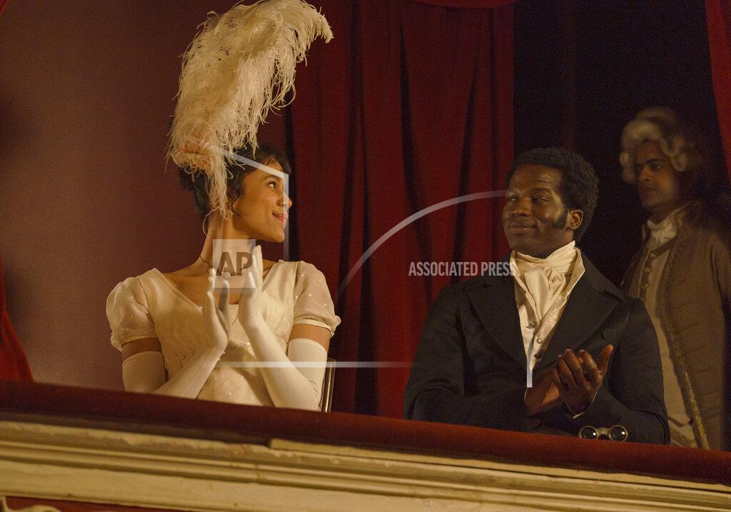Ross Ferguson This image released by Bleecker Street shows Zawe Ashton, left, and Ṣọpẹ́ Dìrísù in a scene from "Mr. Malcolm's List." (Ross Ferguson/Bleecker Street via AP)
