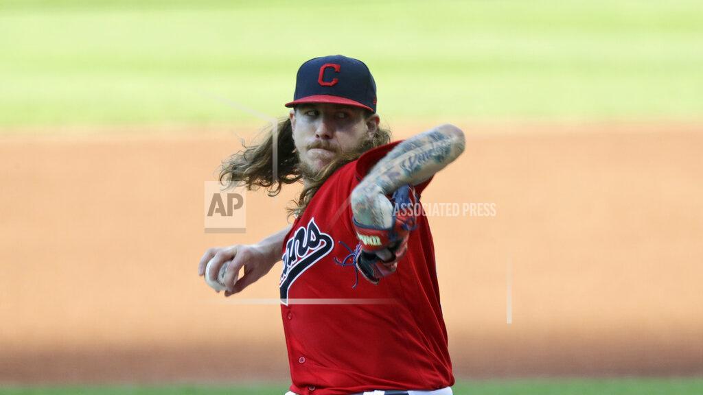 Tony Dejak Cleveland Indians starting pitcher Mike Clevinger delivers in the first inning in a baseball game against the Cincinnati Reds, Wednesday, Aug. 5, 2020, in Cleveland. (AP Photo/Tony Dejak)