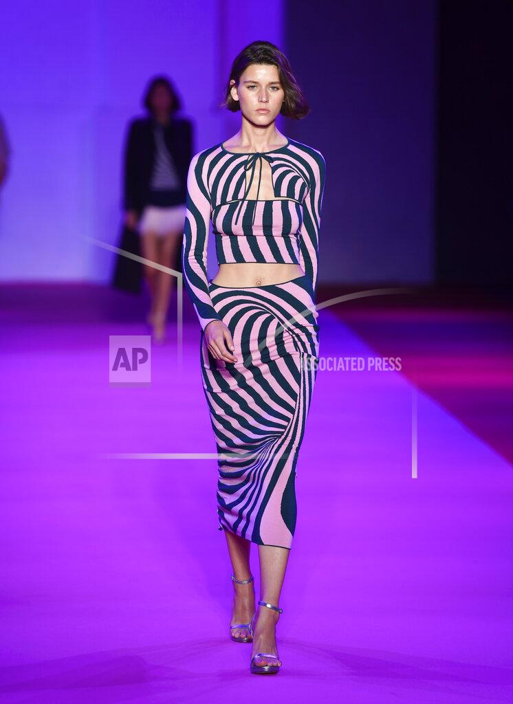 Evan Agostini A model walks the runway at the Brandon Maxwell spring/summer 2022 fashion show in the Brooklyn borough of New York during Fashion Week on Friday, Sept. 10, 2021. (Photo by Evan Agostini/Invision/AP)