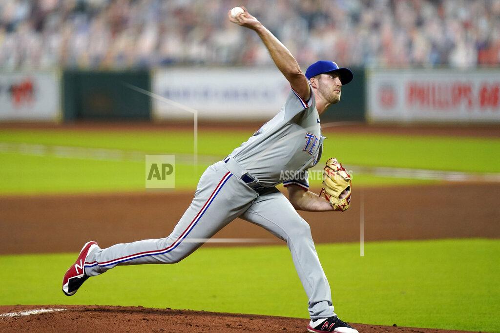 David J. Phillip Texas Rangers starting pitcher Kyle Cody throws against the Houston Astros during the first inning of a baseball game Tuesday, Sept. 15, 2020, in Houston. (AP Photo/David J. Phillip)