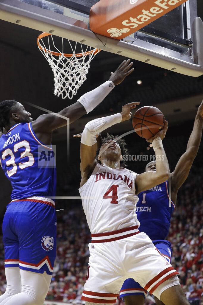 Darron Cummings Indiana's Trayce Jackson-Davis (4) puts up a shot against Louisiana Tech's Andrew Gordon (33) and Derric Jean (1) during the first half of an NCAA college basketball game, Monday, Nov. 25, 2019, in Bloomington, Ind. (AP Photo/Darron Cummings)