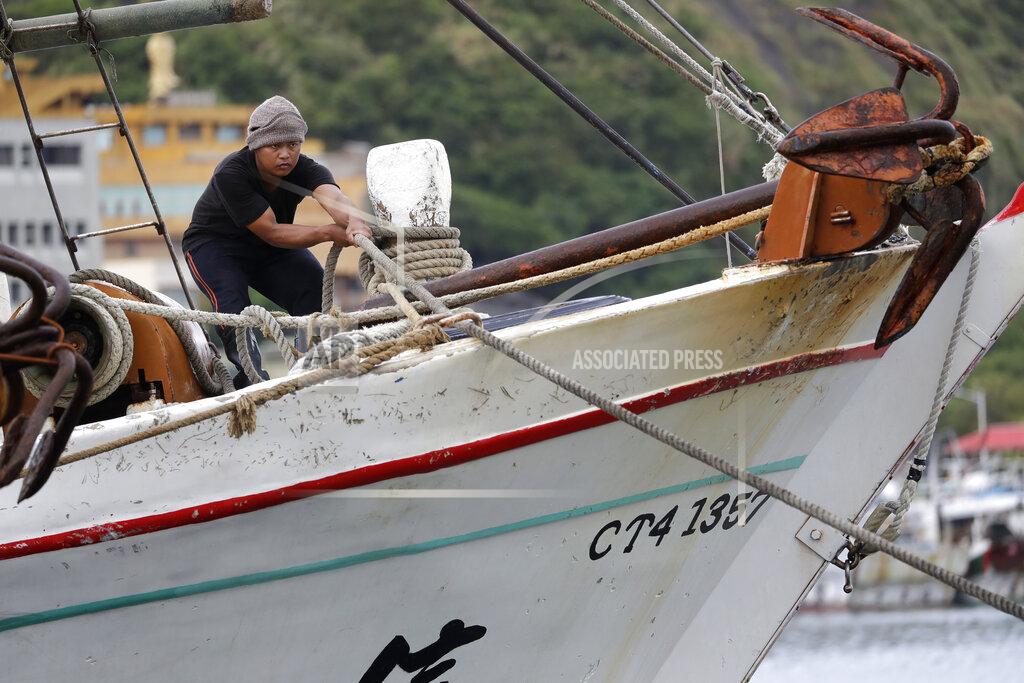 Chiang Ying-Ying A fisherman fastens a boat to take shelter as Typhoon Chanthu approaches to Taiwan in Keelung, New Taipei City, Taiwan, Saturday, Sept. 11, 2021. Taiwan’s weather bureau warned of high winds and heavy rain as Typhoon Chanthu roared toward the island Saturday and said the storm’s center was likely to pass its east coast instead of hitting land. (AP Photo/Chiang Ying-ying)