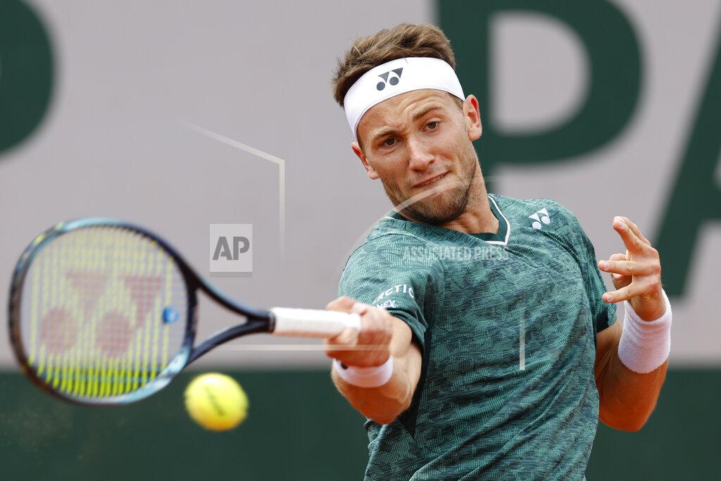 Jean-Francois Badias Norway's Casper Ruud plays a shot against Finland's Emil Ruusuvuori during their second round match at the French Open tennis tournament in Roland Garros stadium in Paris, France, Thursday, May 26, 2022. (AP Photo/Jean-Francois Badias)
