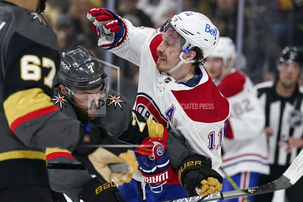 John Locher Vegas Golden Knights defenseman Alex Pietrangelo (7) and Montreal Canadiens right wing Brendan Gallagher (11) tussle during the first period in Game 5 of an NHL hockey Stanley Cup semifinal playoff series Tuesday, June 22, 2021, in Las Vegas. (AP Photo/John Locher)