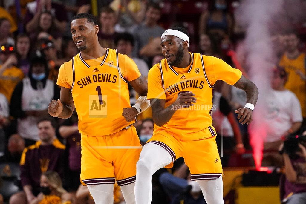 Matt York Arizona State guard Marreon Jackson and guard Luther Muhammad (1) celebrate a three pointer against California during the second half of an NCAA college basketball game, Thursday, March 3, 2022, in Tempe, Ariz. (AP Photo/Matt York)